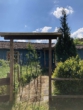 Bild - Wochenendhaus mit Nebengebäude und Carport