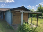 Bild - Wochenendhaus mit Nebengebäude und Carport