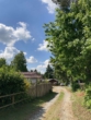 Bild - Wochenendhaus mit Nebengebäude und Carport